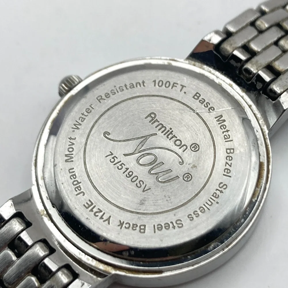 Armitron Now Women's Watch 28mm Silver Tone Crystals MOP Dial New Battery 6.75